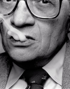 Black and white photography of Larry King smoking, by Michael O'Neill